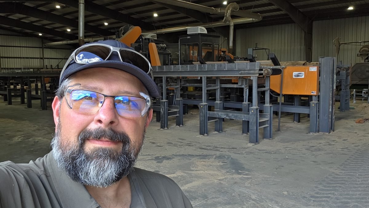 Sawmill log deck and infeed