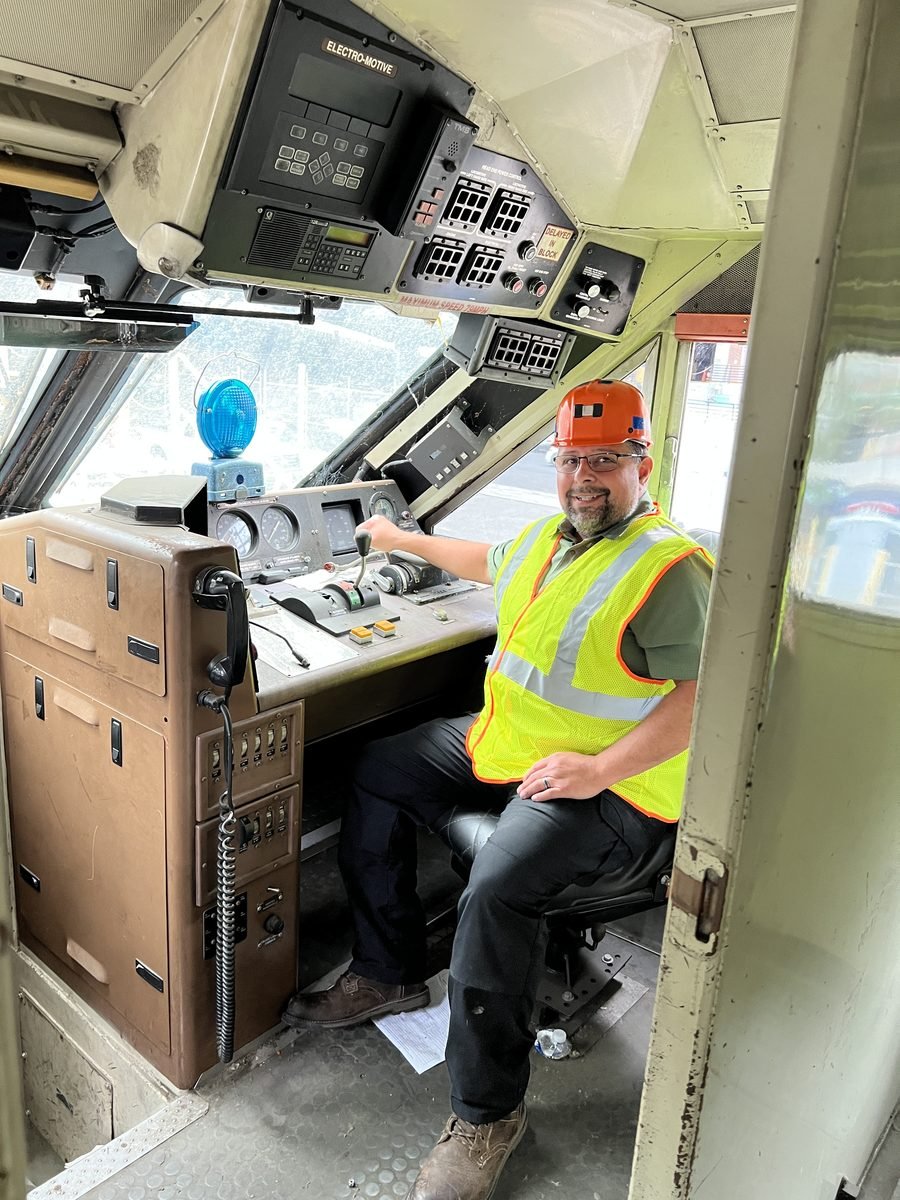 Nathan Bazzle inspecting a locomotive cab